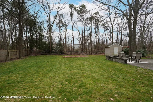 a view of a backyard with palm trees