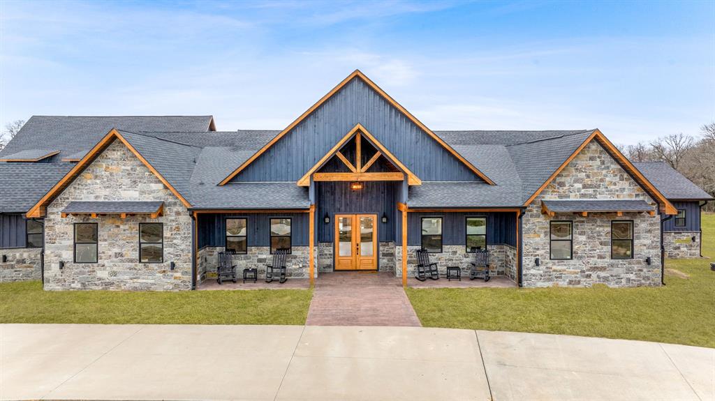 239 32507th Road Paris, TX 75460 - Photo 17 of 40 a front view of a house with a yard