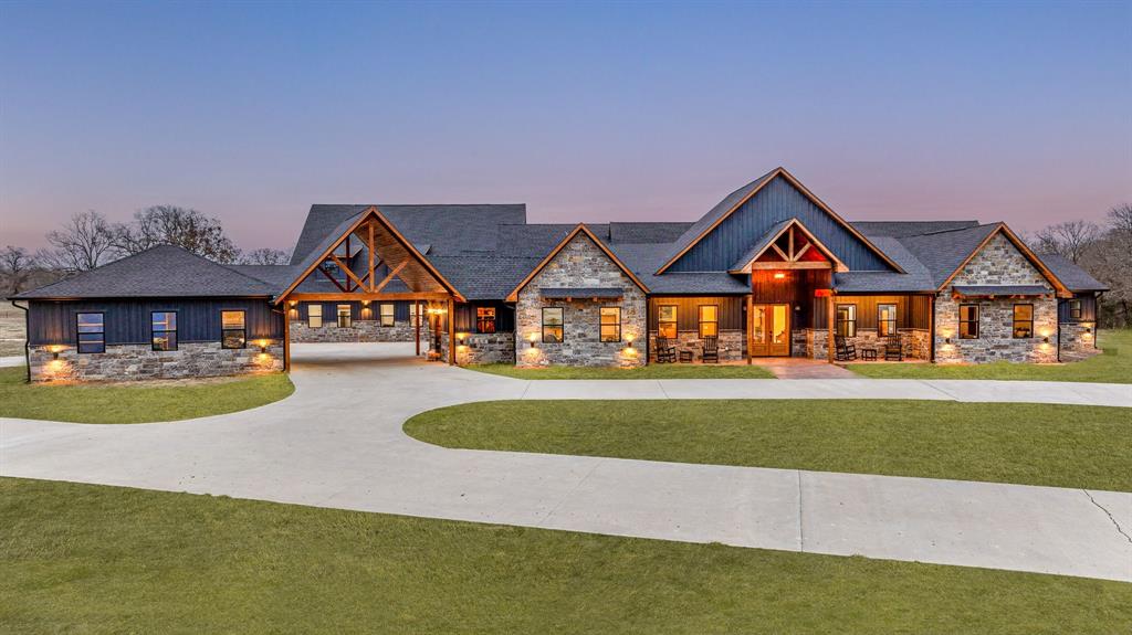 239 32507th Road Paris, TX 75460 - Photo 3 of 40 a front view of a house with a yard