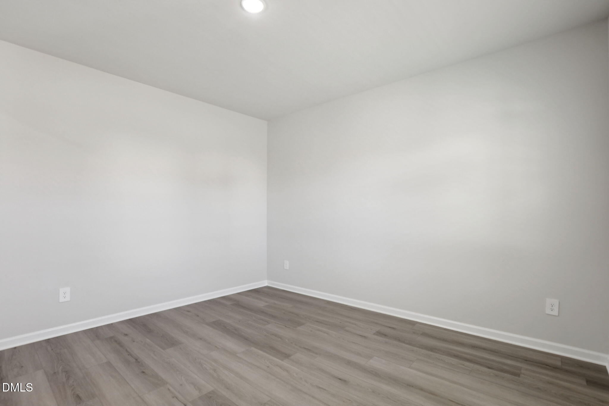 36 Hoff Court Angier, NC 27501 - Photo 9 of 43 a view of an empty room with wooden floor