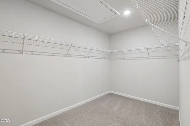 a view of a room with racks on the wall