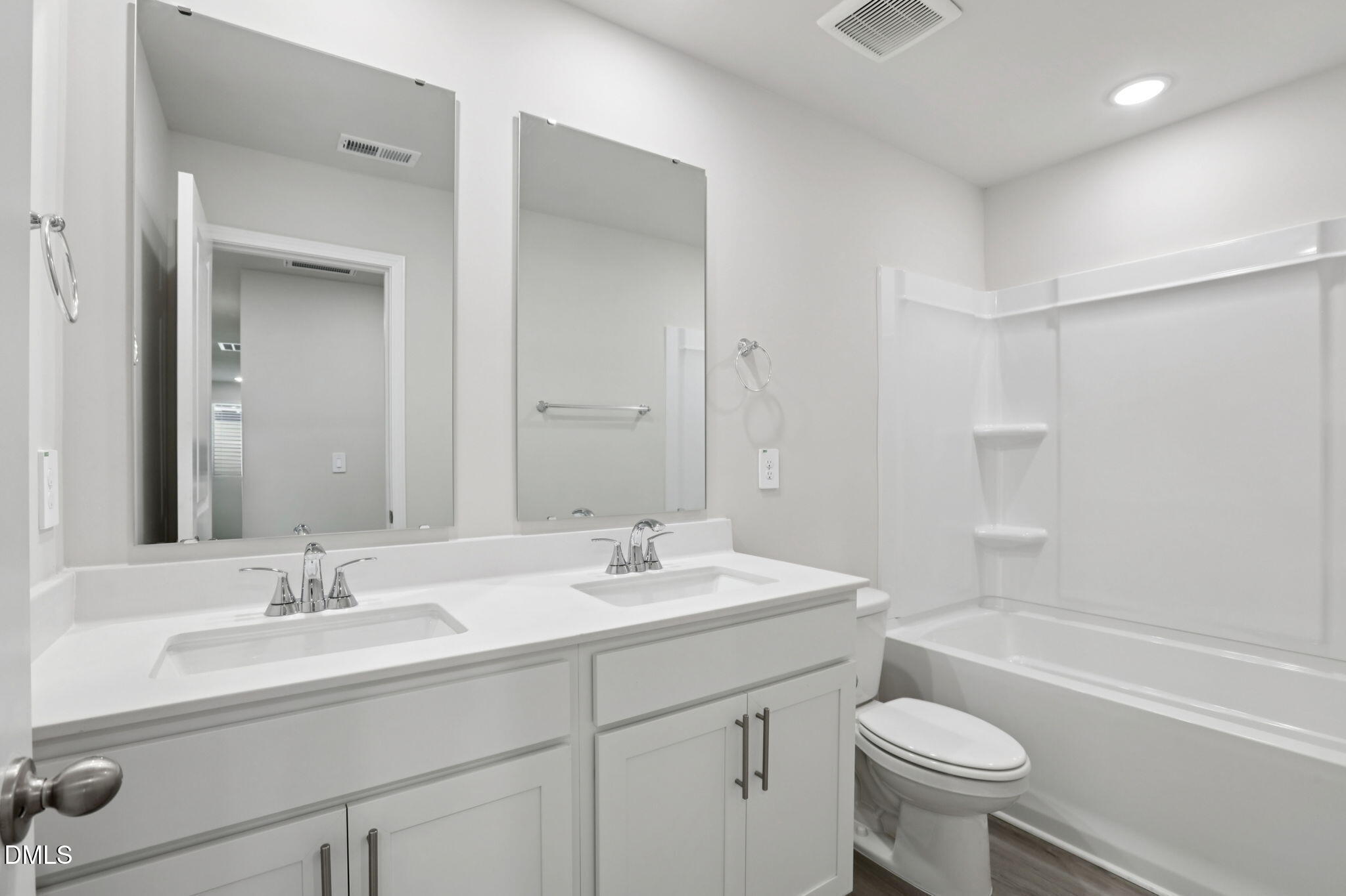 36 Hoff Court Angier, NC 27501 - Photo 32 of 43 a bathroom with a sink double vanity granite toilet tub and shower