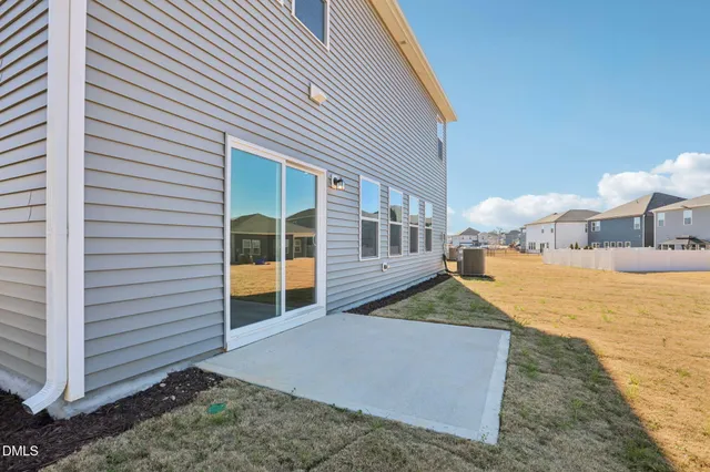 a view of a big room with windows