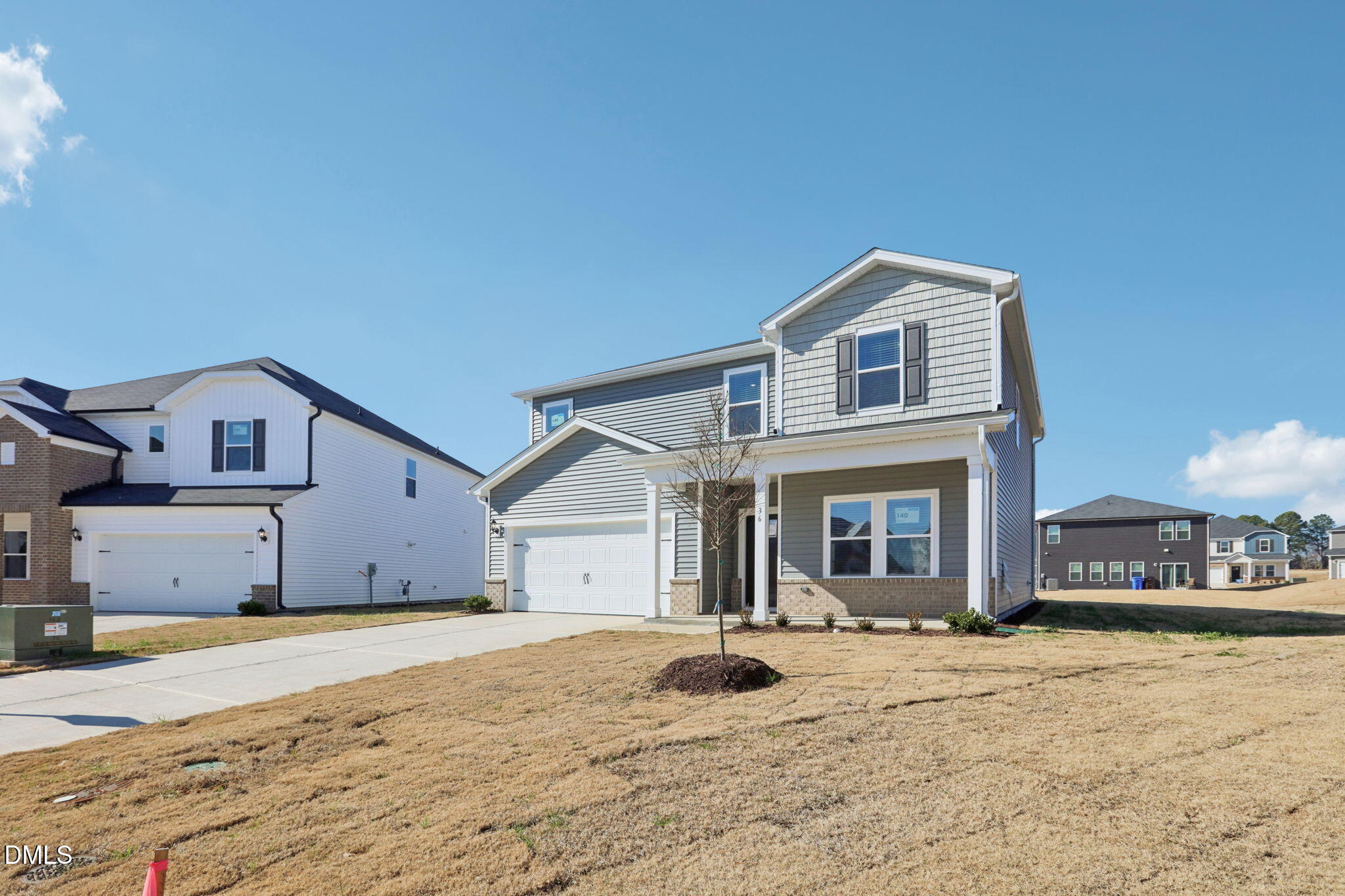 36 Hoff Court Angier, NC 27501 - Photo 3 of 43 a front view of a house with a yard