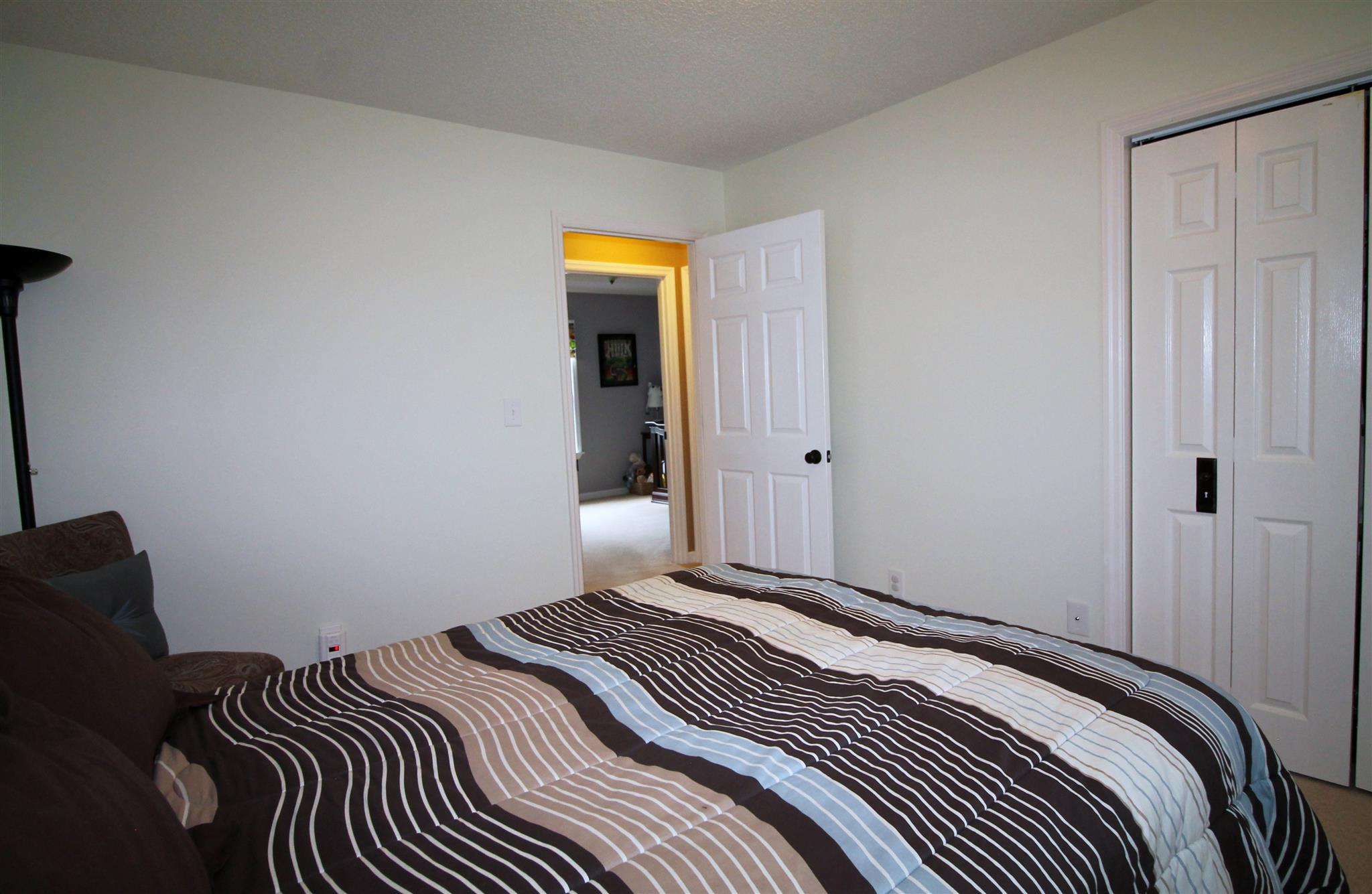 1539 West Harpeth Road Franklin, TN 37064 - Photo 20 of 30 a bedroom with a bed and a closet