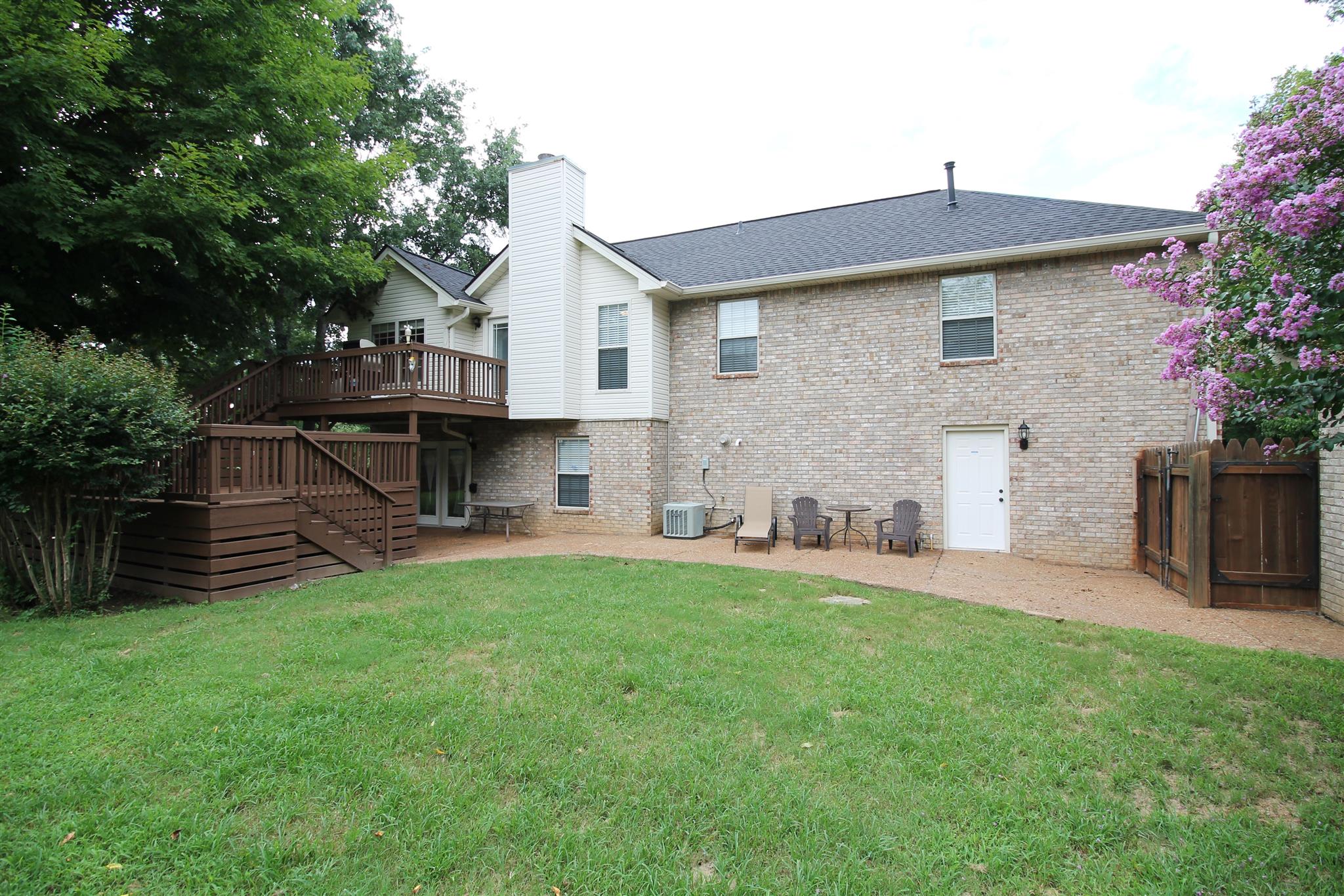 1539 West Harpeth Road Franklin, TN 37064 - Photo 29 of 30 a front view of a house with a yard