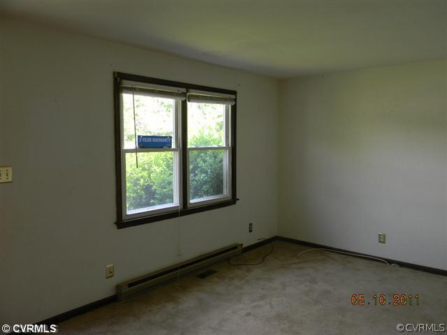 17850 Willowynde Road Chester, VA 23836 - Photo 3 of 5 a view of a room that has a window