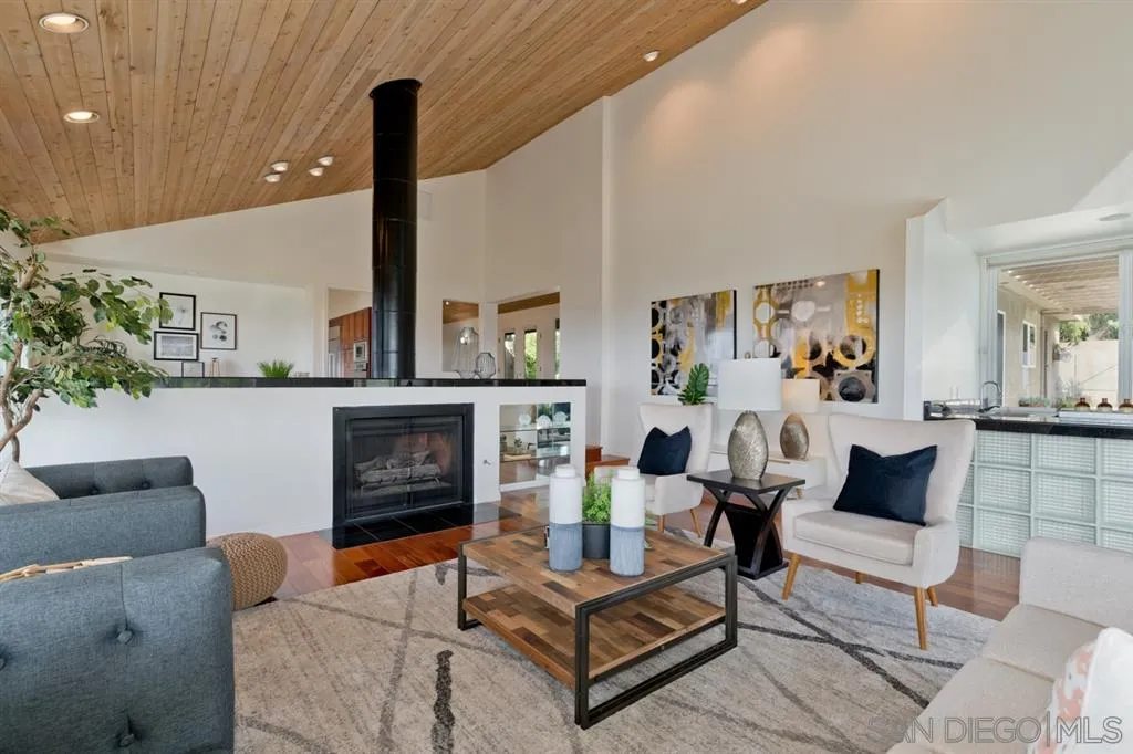 13606 Acorn Patch Lane Poway, CA 92064 - Photo 12 of 25 a living room with furniture and a fireplace