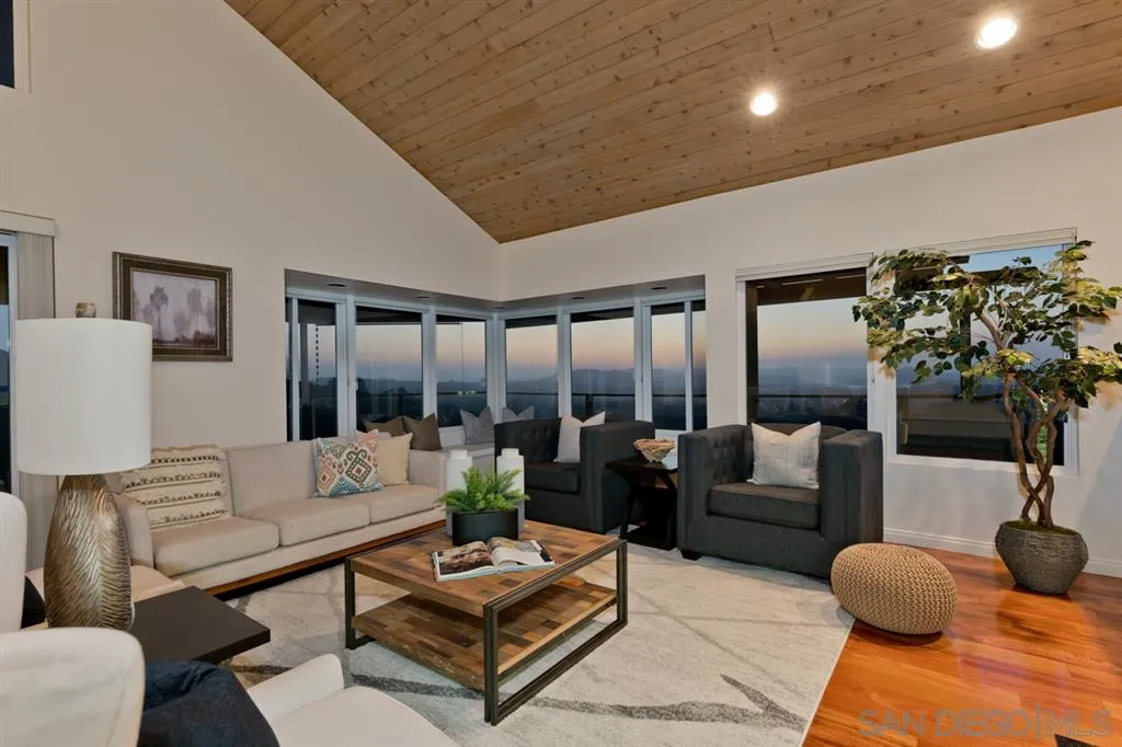 13606 Acorn Patch Lane Poway, CA 92064 - Photo 13 of 25 a living room with furniture and a potted plant