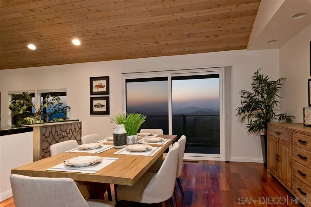 13606 Acorn Patch Lane Poway, CA 92064 - Photo 15 of 25 a dining room with a table and chairs