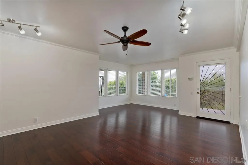 13606 Acorn Patch Lane Poway, CA 92064 - Photo 24 of 25 a view of empty room with wooden floor and fan