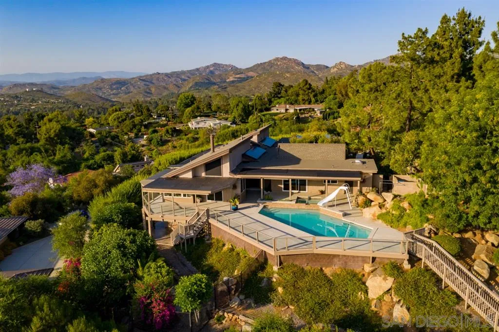 13606 Acorn Patch Lane Poway, CA 92064 - Photo 3 of 25 an aerial view of a house with a mountain