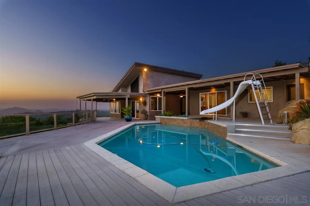 13606 Acorn Patch Lane Poway, CA 92064 - Photo 4 of 25 a view of house with swimming pool and sitting area