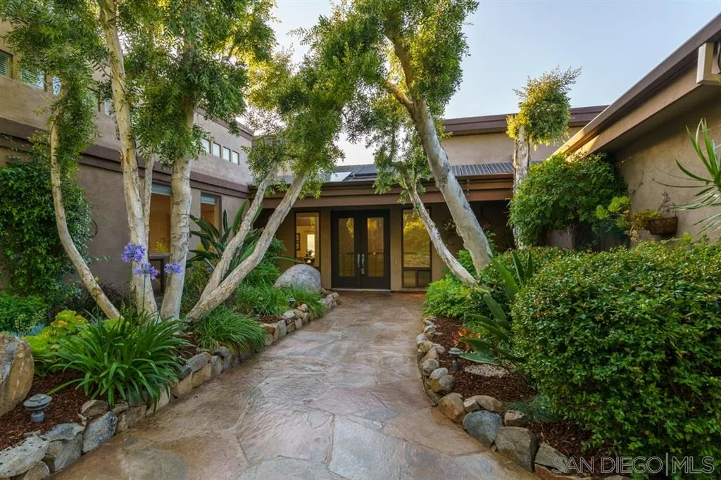 13606 Acorn Patch Lane Poway, CA 92064 - Photo 10 of 25 a front view of a house with garden