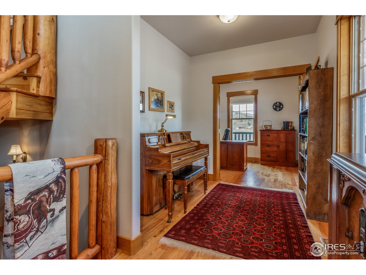 501 Blue Mountain Road Lyons, CO 80540 - Photo 11 of 29 Piano room/hallway