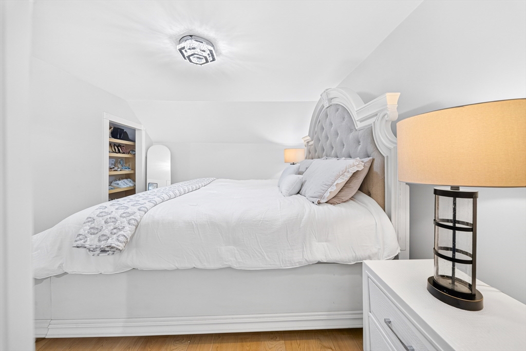 24 Miller Road Wilmington, MA 01887 - Photo 28 of 40 a bedroom with a bed and window