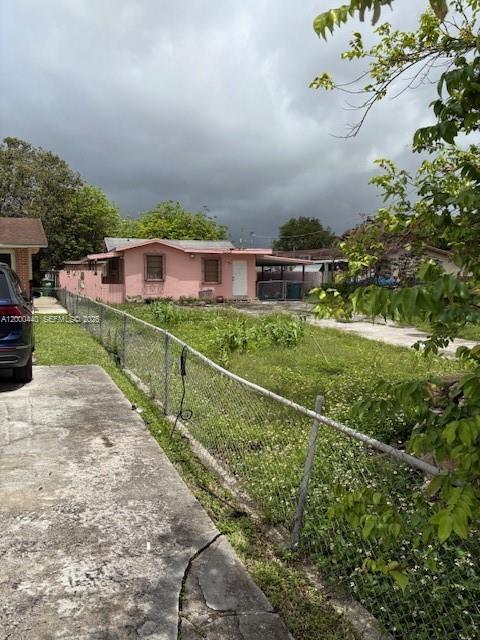 7161 Southwest 22nd Street Miami, FL 33155 - Photo 7 of 11 a view of a terrace with a garden