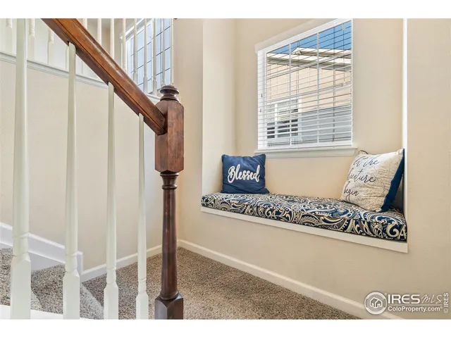 a kitchen with a refrigerator and a sink