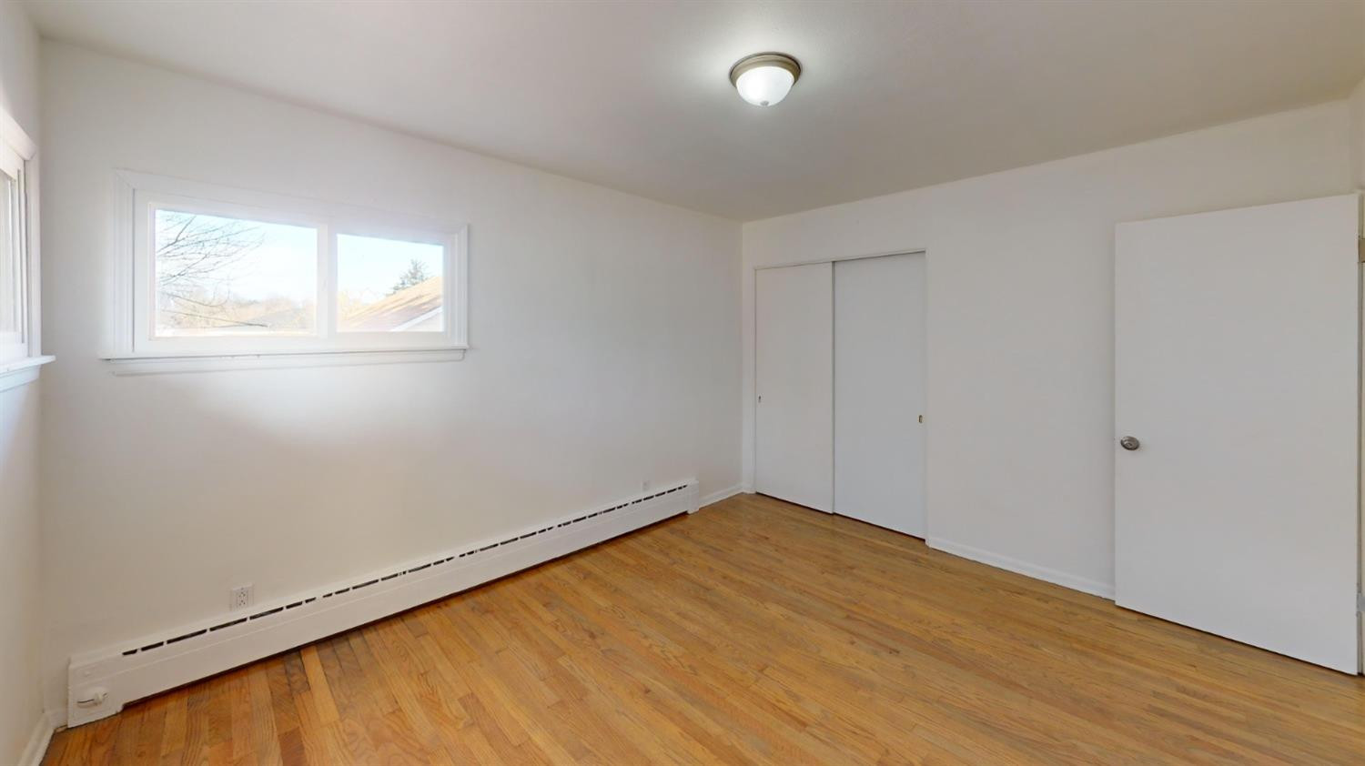 608 East Ridge Road Gary, IN 46409 - Photo 13 of 27 an empty room with a window