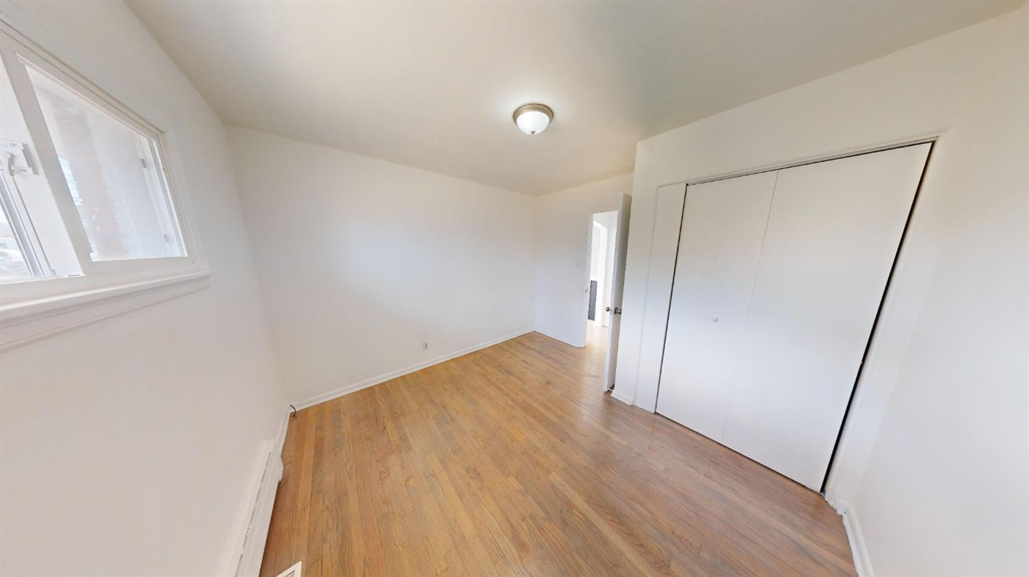 608 East Ridge Road Gary, IN 46409 - Photo 15 of 27 a view of empty room with wooden floor