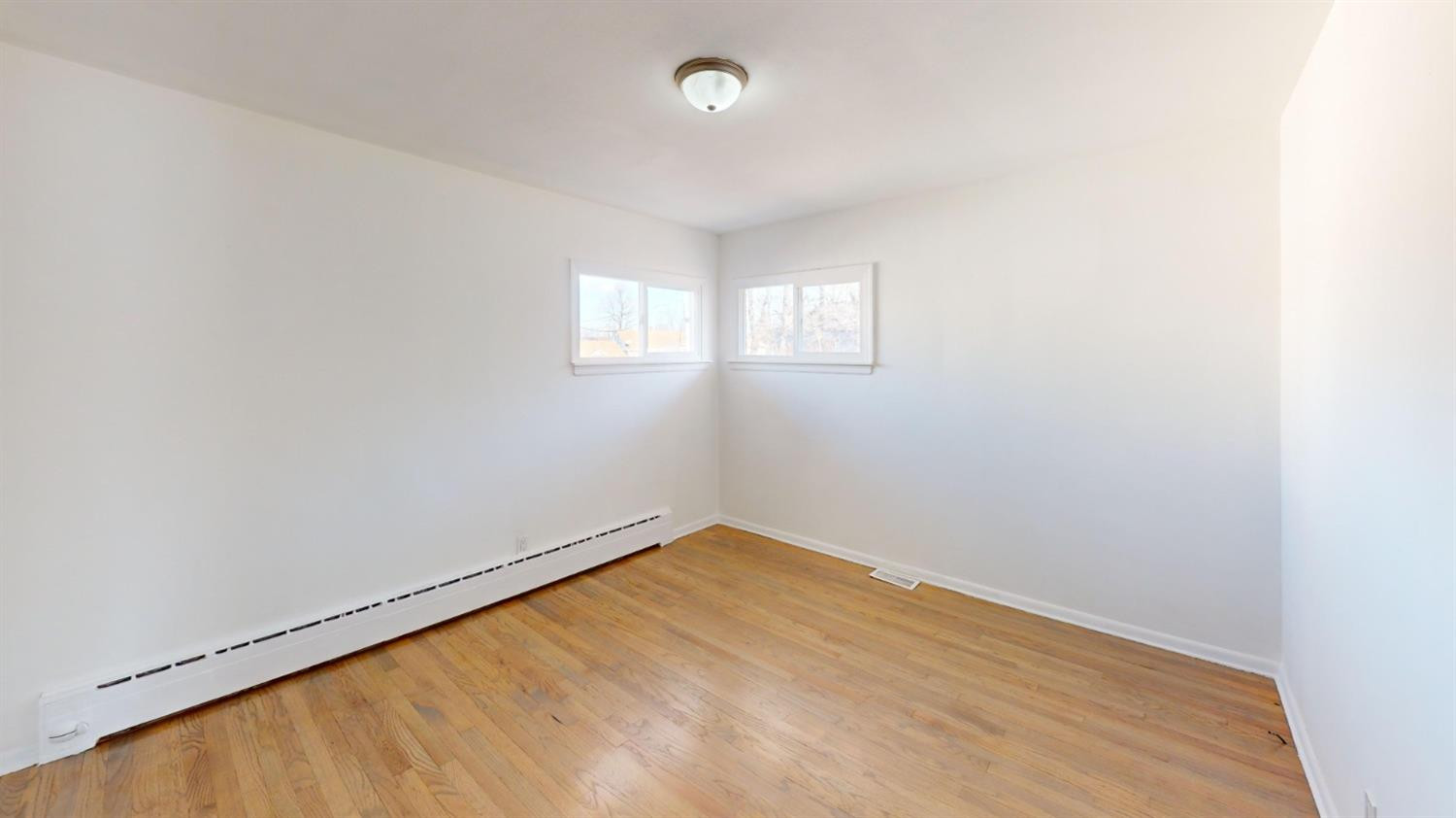 608 East Ridge Road Gary, IN 46409 - Photo 8 of 27 an empty room with a window