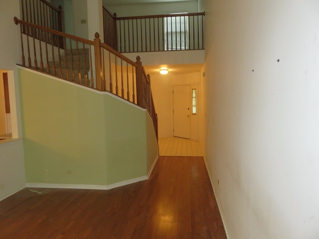 2116 Peach Tree Lane, Unit 4243 Algonquin, IL 60102 - Photo 5 of 25 a view of balcony with wooden floor