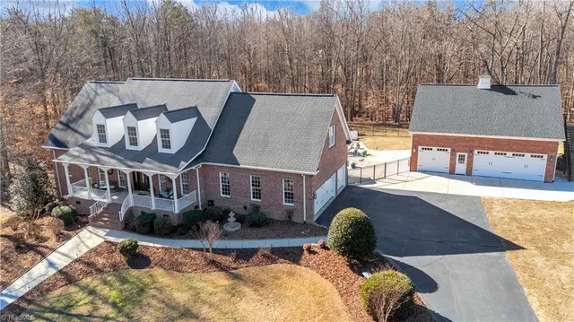 $1,050,000 | 7897 Misty Hollow Lane, Oak Ridge, NC 27310