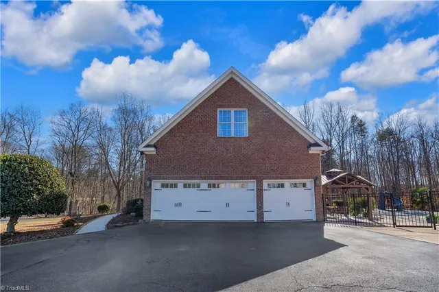 $1,050,000 | 7897 Misty Hollow Lane, Oak Ridge, NC 27310