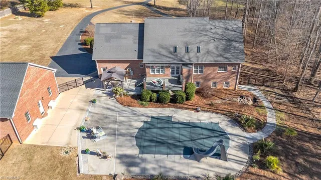 $1,050,000 | 7897 Misty Hollow Lane, Oak Ridge, NC 27310