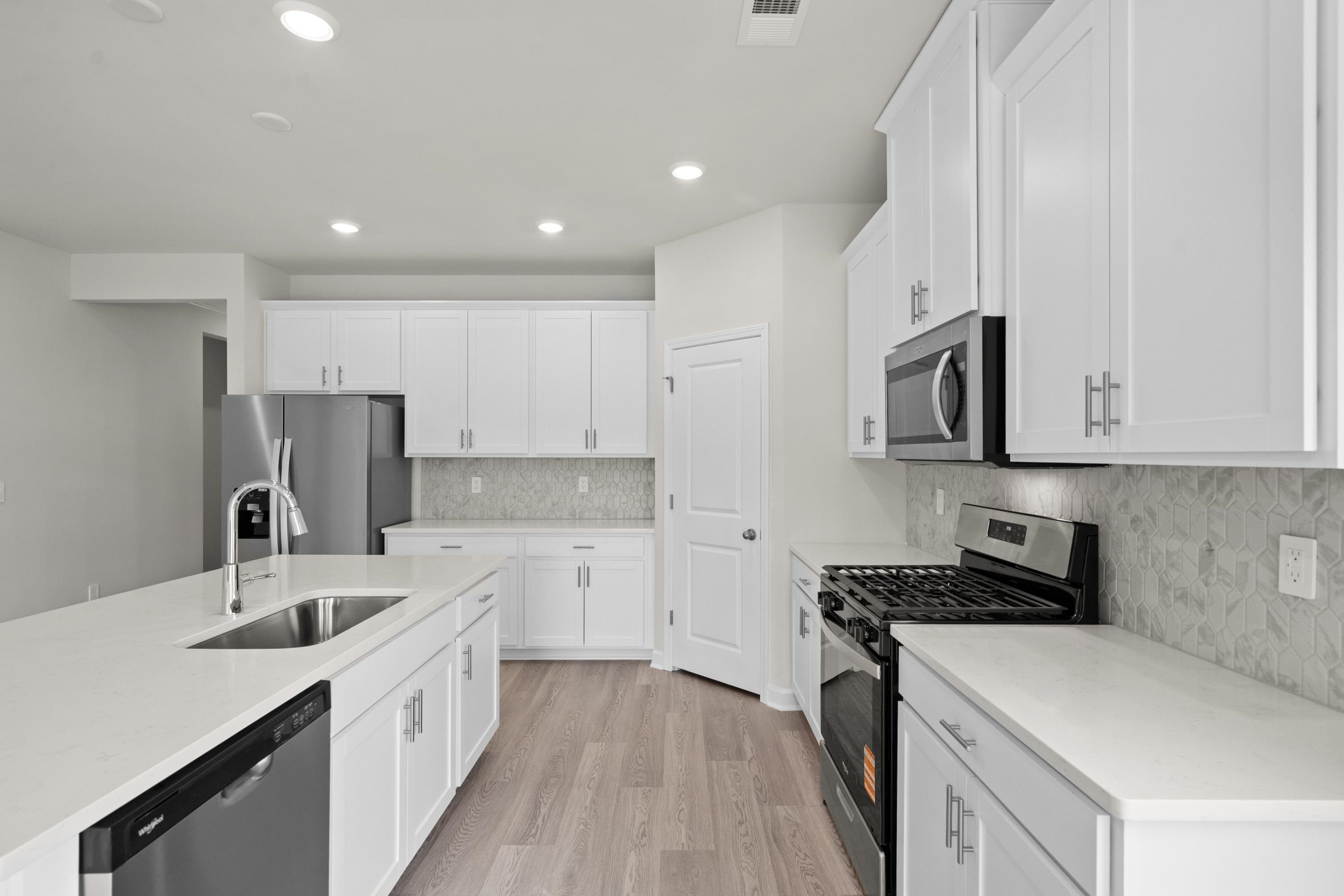 8224 Sparkle Drive Longs, SC 29568 - Photo 5 of 16 Photo is not of the actual home, but is an example photo of a completed home and may depict options and/or features that are not included