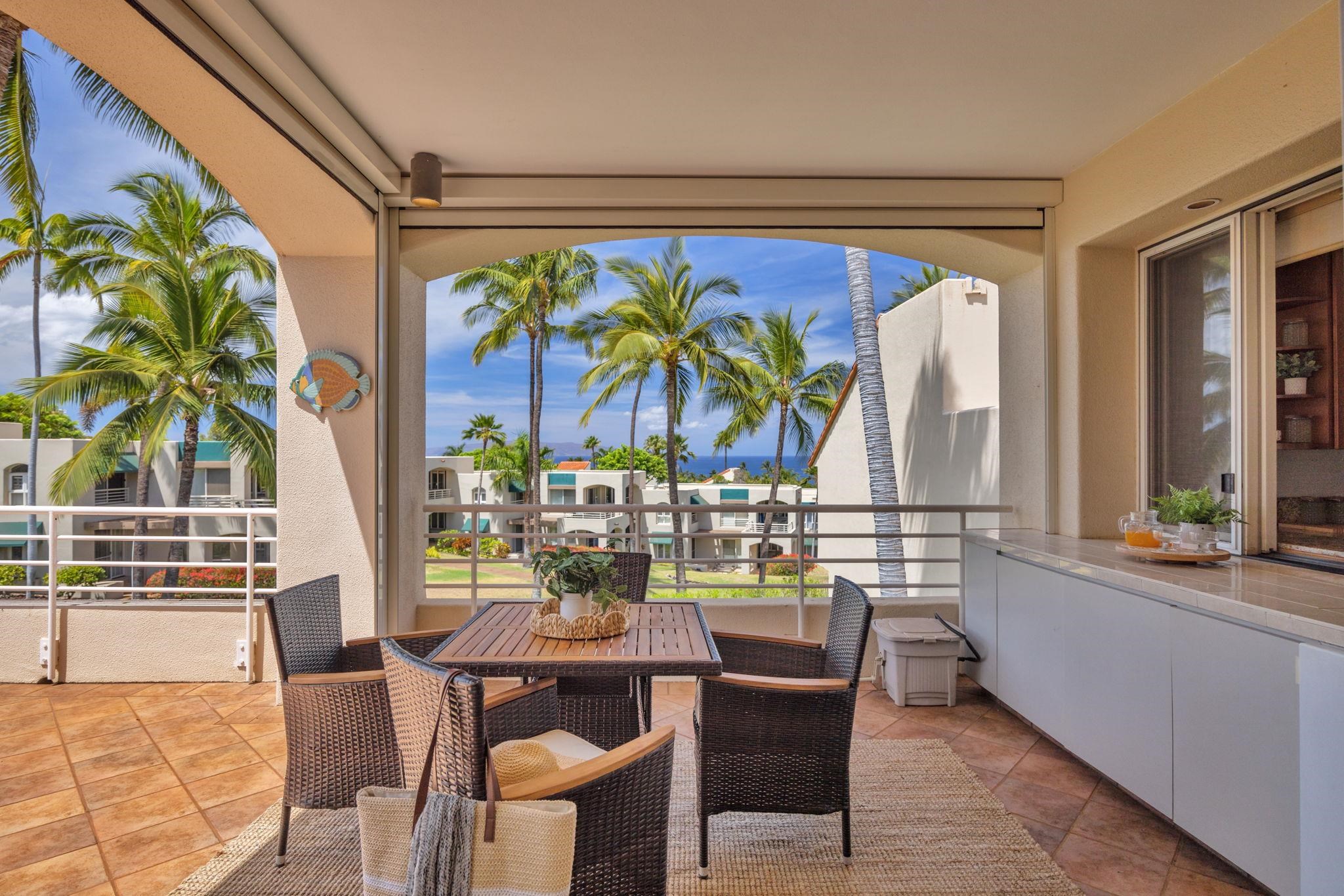 3150 Wailea Alanui Drive, Unit 2504 Kihei, HI 96753 - Photo 20 of 47 a view of a dining room with furniture and chandelier