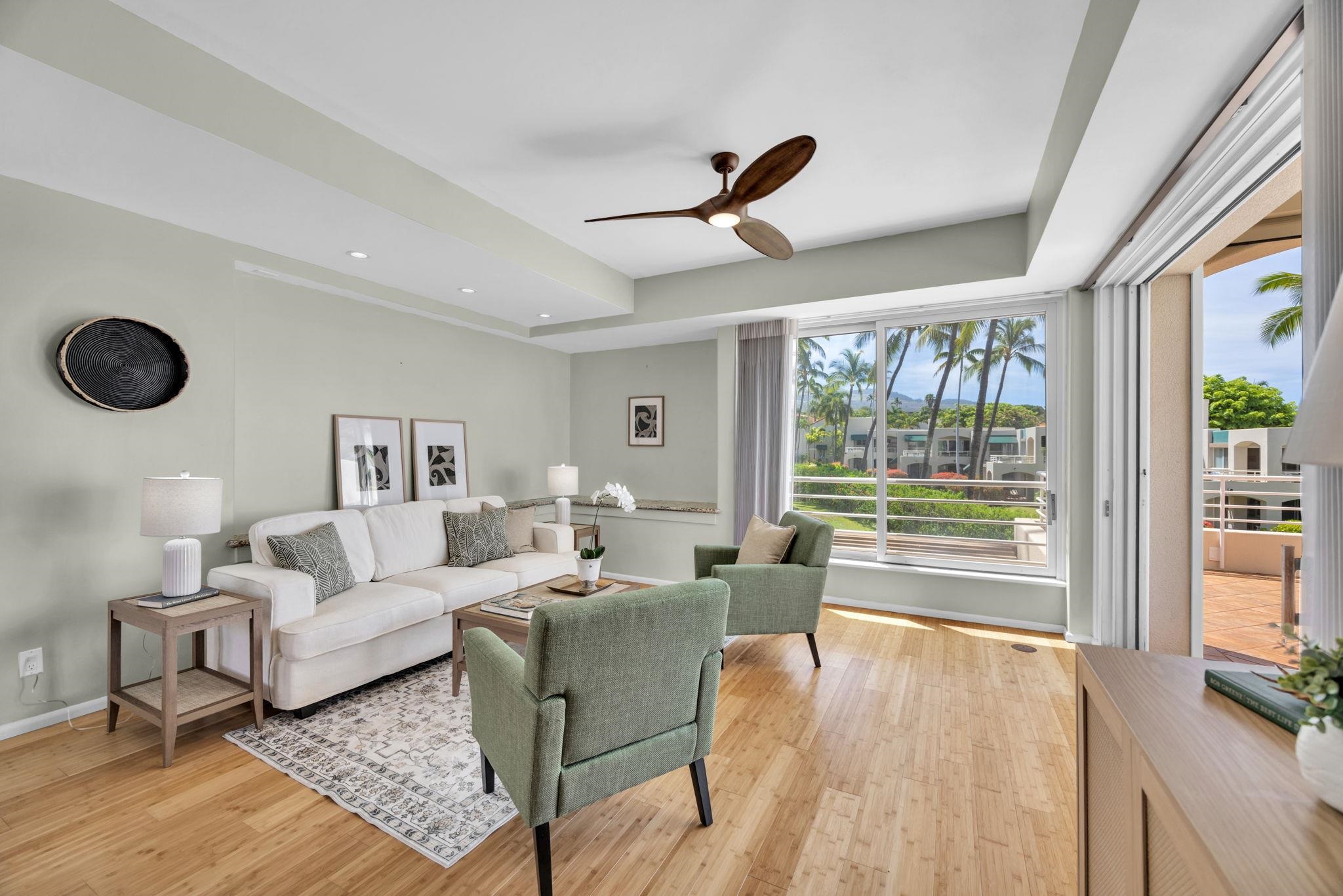 3150 Wailea Alanui Drive, Unit 2504 Kihei, HI 96753 - Photo 8 of 47 a living room with furniture and a large window