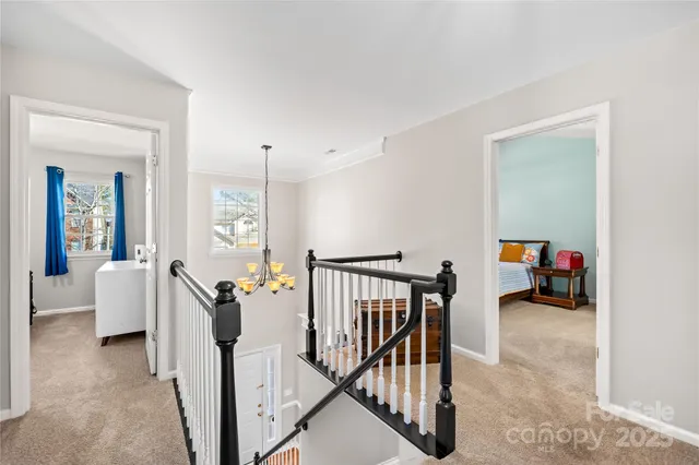 a view of swimming pool from a balcony