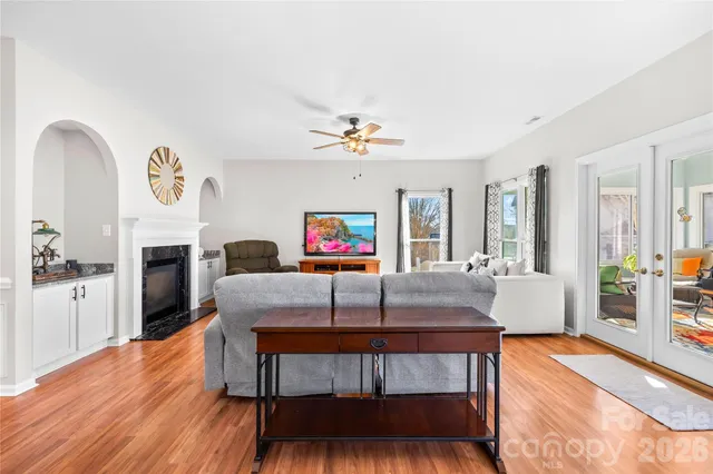 a view of swimming pool with outdoor seating and yard