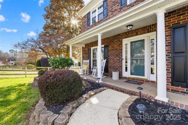 a kitchen with stainless steel appliances granite countertop a stove sink microwave and cabinets