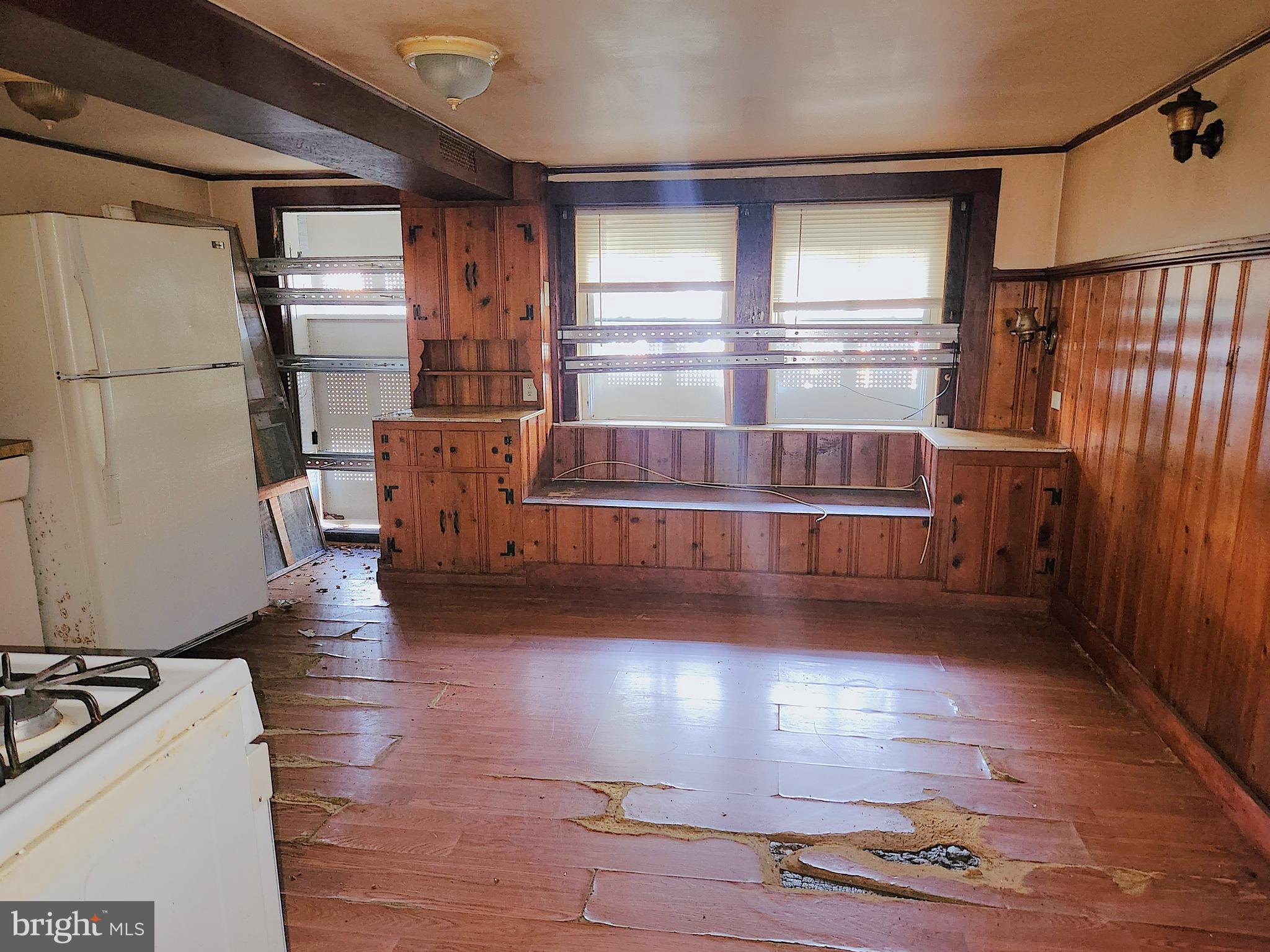 3336 Chesterfield Avenue Baltimore, MD 21213 - Photo 14 of 16 a living room with hard wood floors and a window