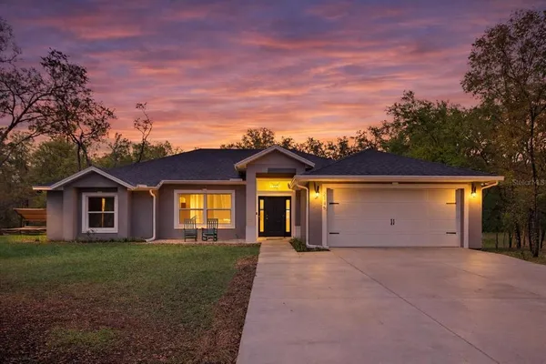 front view of house with a yard