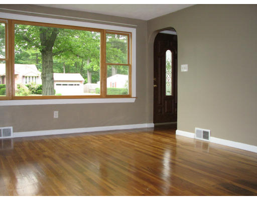 168 Woodcrest Road Springfield, MA 01129 - Photo 7 of 13 a view of an empty room with wooden floor and a window