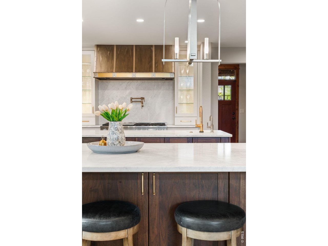 316 Wood Street Fort Collins, CO 80521 - Photo 11 of 50 a kitchen with a table and chairs in it