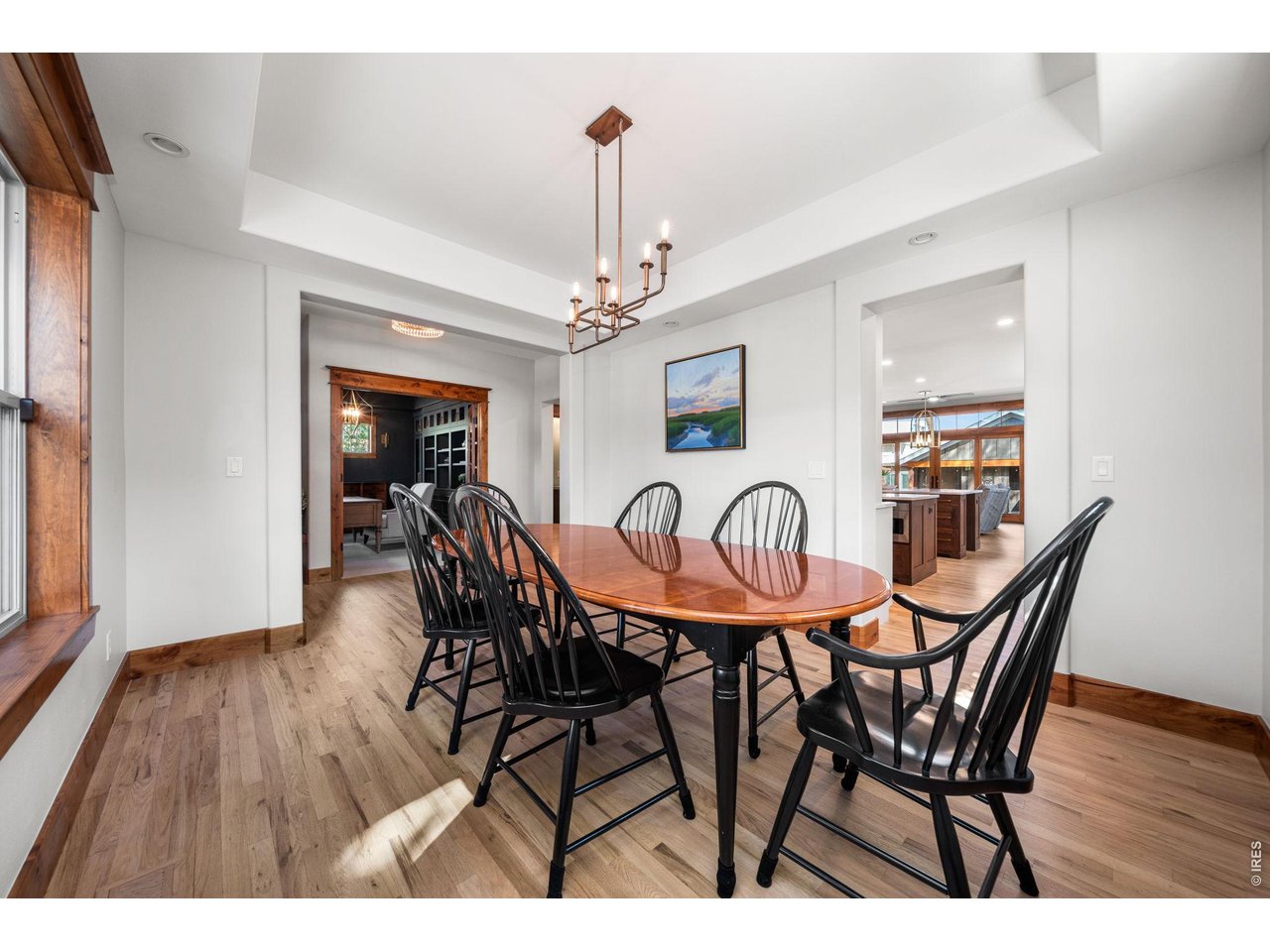 316 Wood Street Fort Collins, CO 80521 - Photo 19 of 50 a view of a dining room with furniture and wooden floor