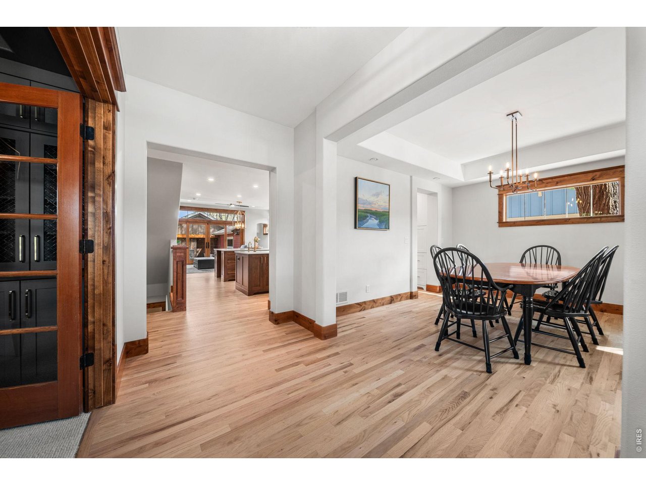 316 Wood Street Fort Collins, CO 80521 - Photo 20 of 50 a view of a dining room with furniture and wooden floor