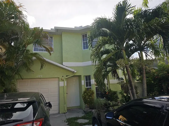 a car parked in front of a house