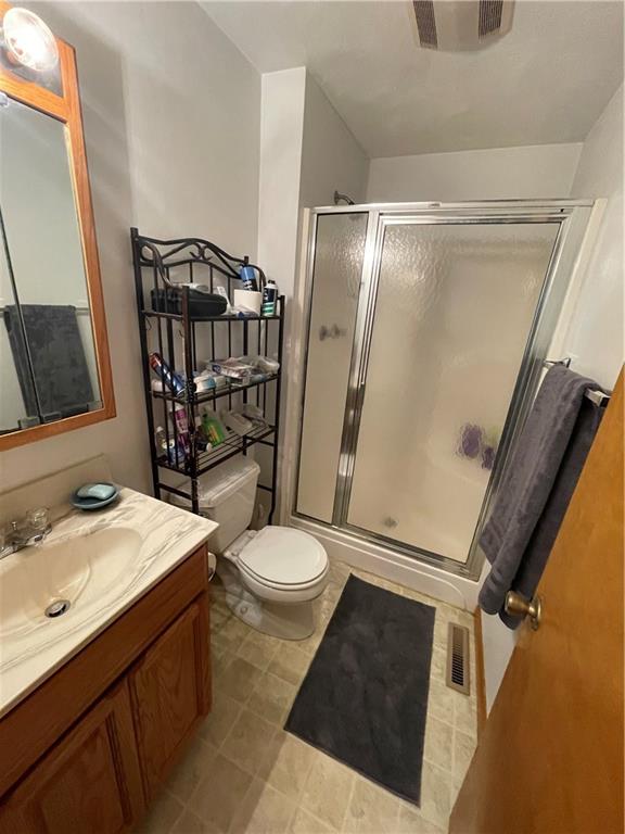 809 West Union Road West Lebanon, PA 15783 - Photo 20 of 25 a bathroom with a sink a toilet a mirror and shower
