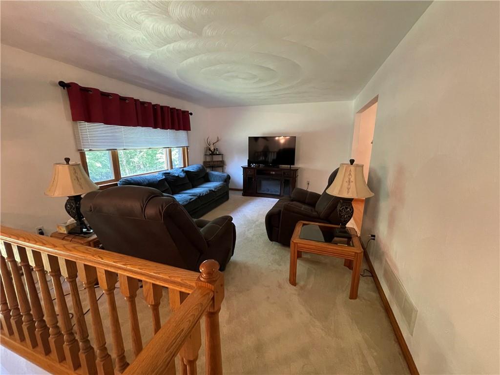 809 West Union Road West Lebanon, PA 15783 - Photo 9 of 25 a living room with furniture a flat screen tv and a window