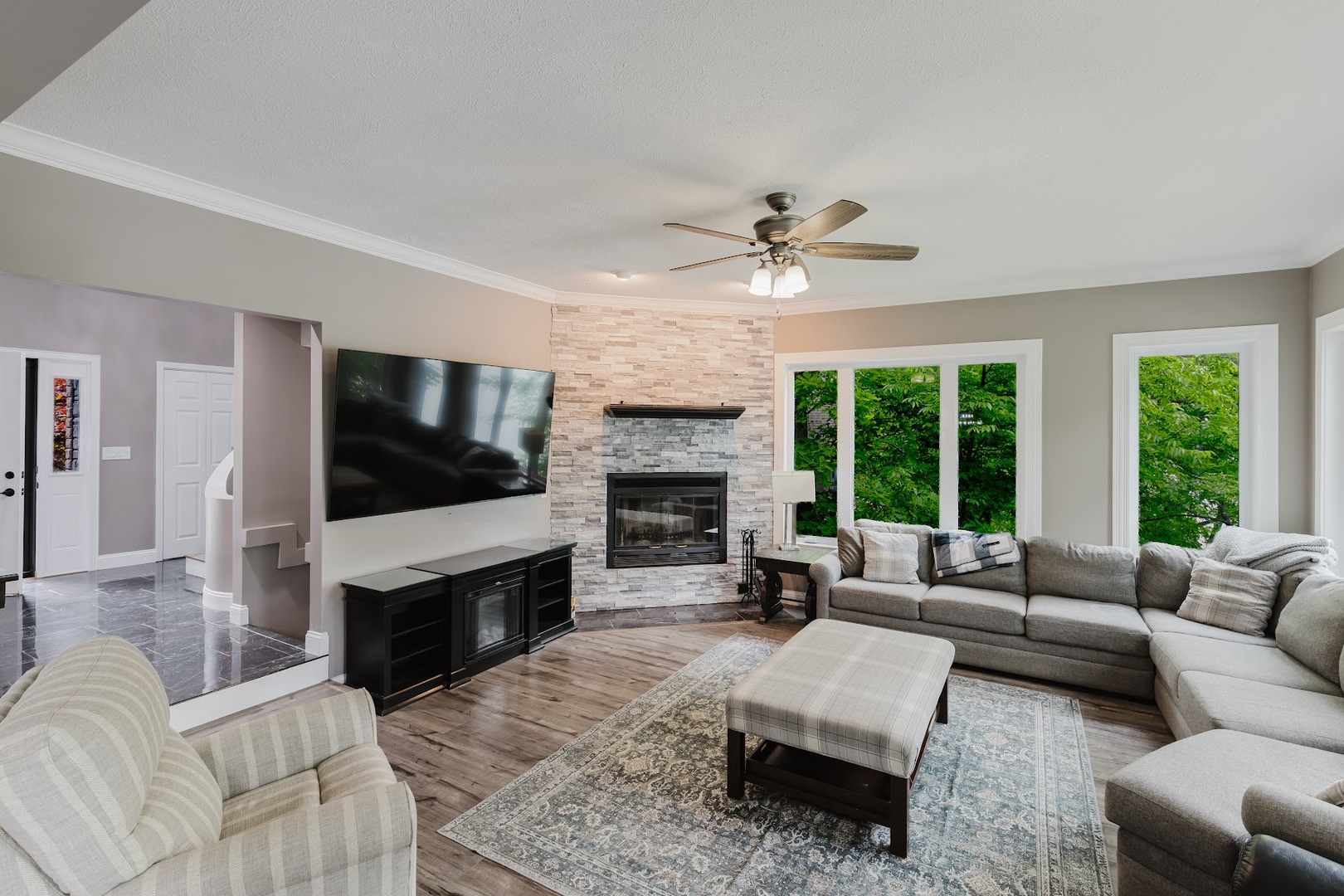 12225 Pebble Point Road Marion, IL 62959 - Photo 14 of 88 a living room with furniture a flat screen tv and a fireplace