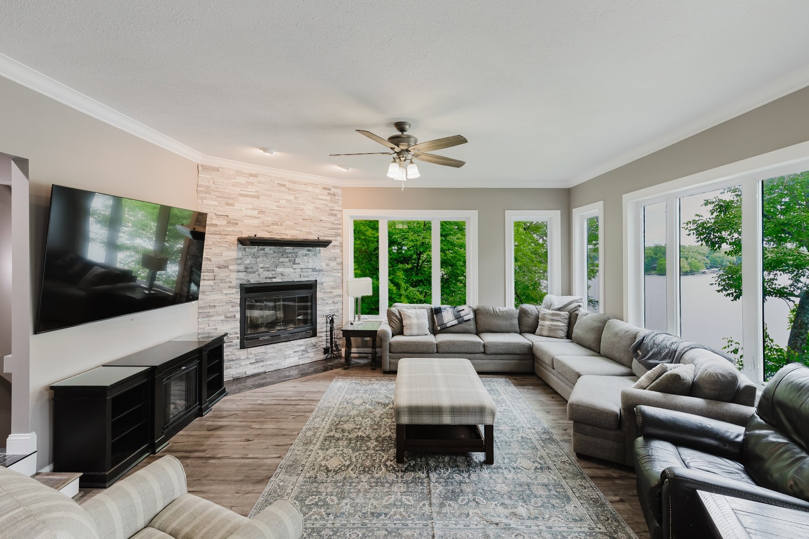 12225 Pebble Point Road Marion, IL 62959 - Photo 15 of 88 a living room with furniture a fireplace and a flat screen tv