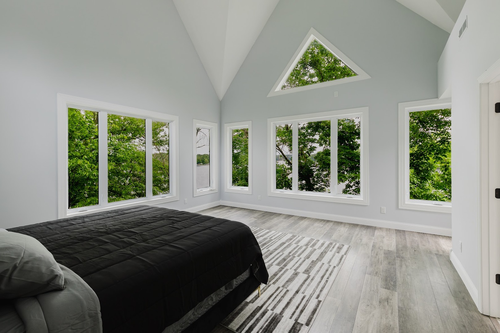 12225 Pebble Point Road Marion, IL 62959 - Photo 33 of 88 a bed sitting in a bedroom next to a window