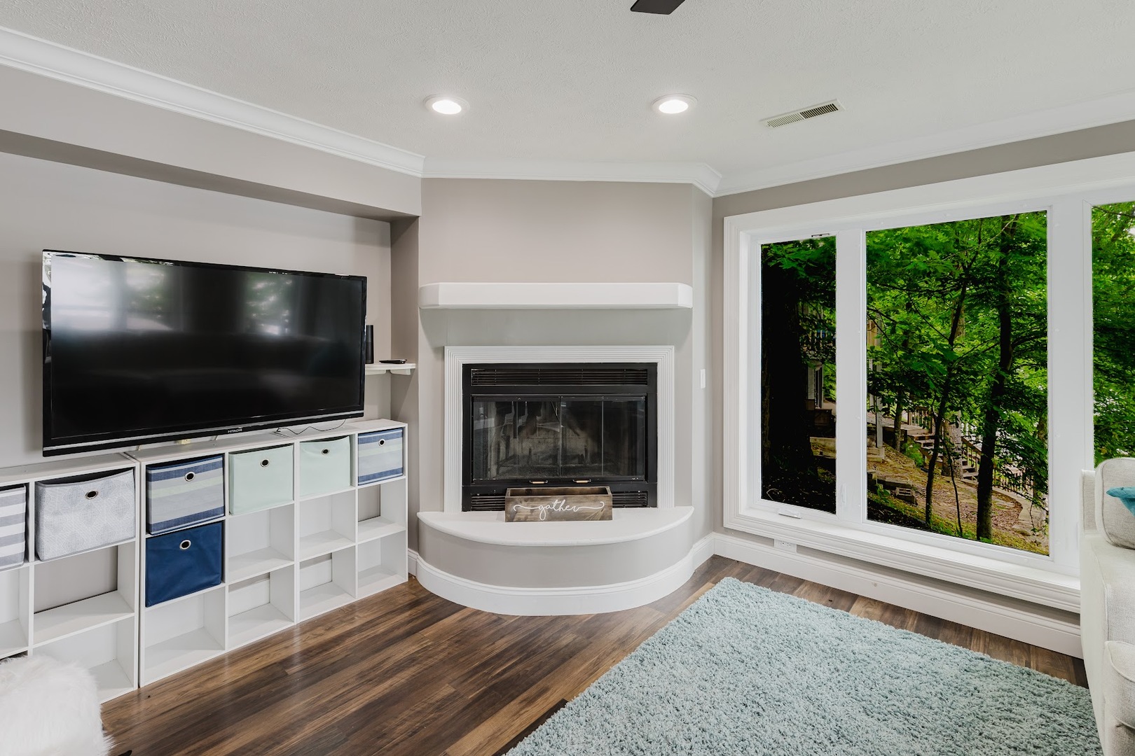 12225 Pebble Point Road Marion, IL 62959 - Photo 44 of 88 a living room with fireplace and a flat screen tv