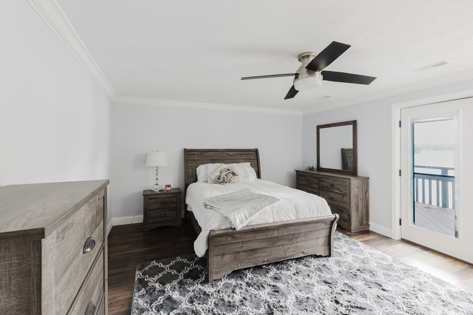 12225 Pebble Point Road Marion, IL 62959 - Photo 57 of 88 a bedroom with a bed and a chandelier
