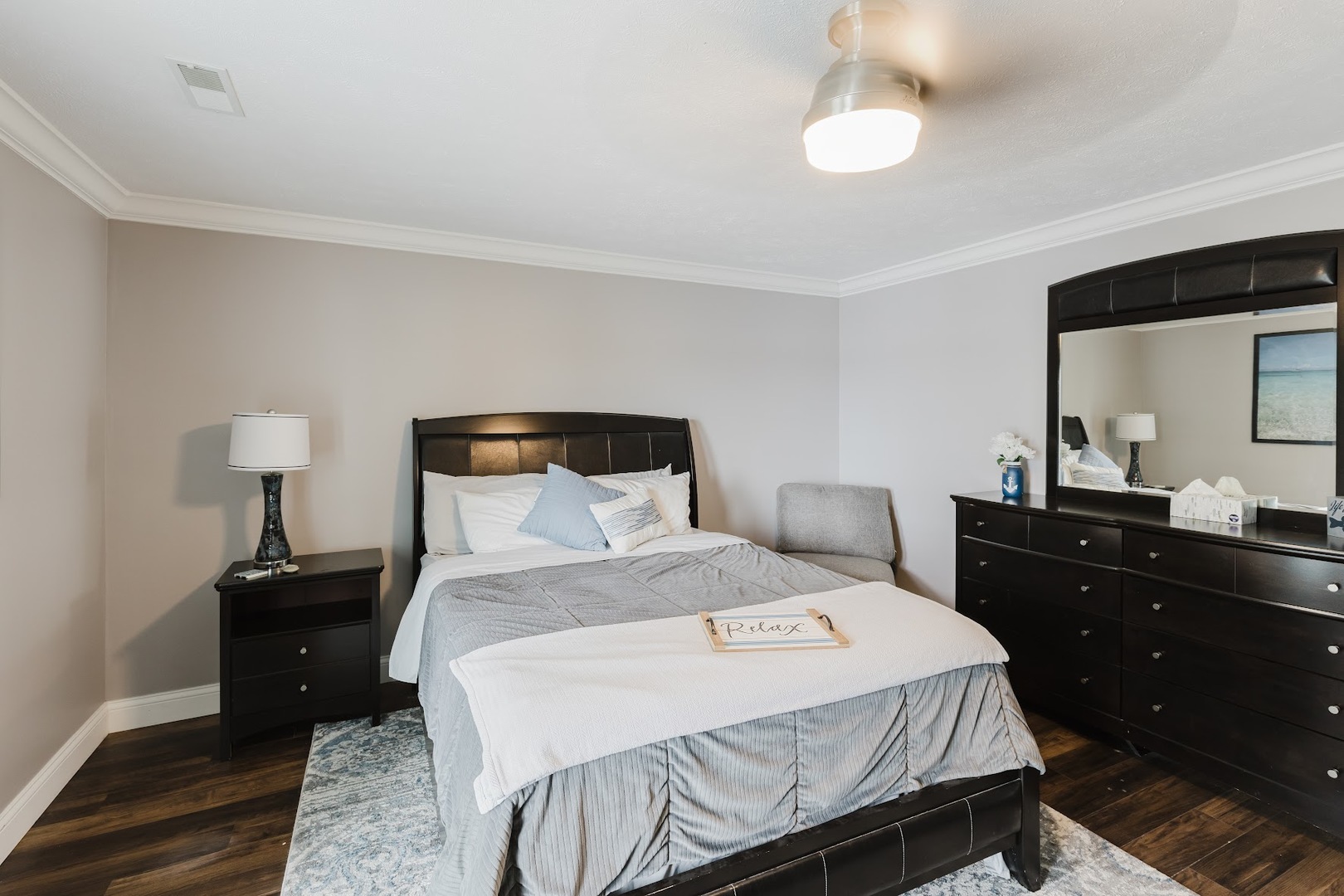 12225 Pebble Point Road Marion, IL 62959 - Photo 61 of 88 a bedroom with a bed and a lamp on dresser